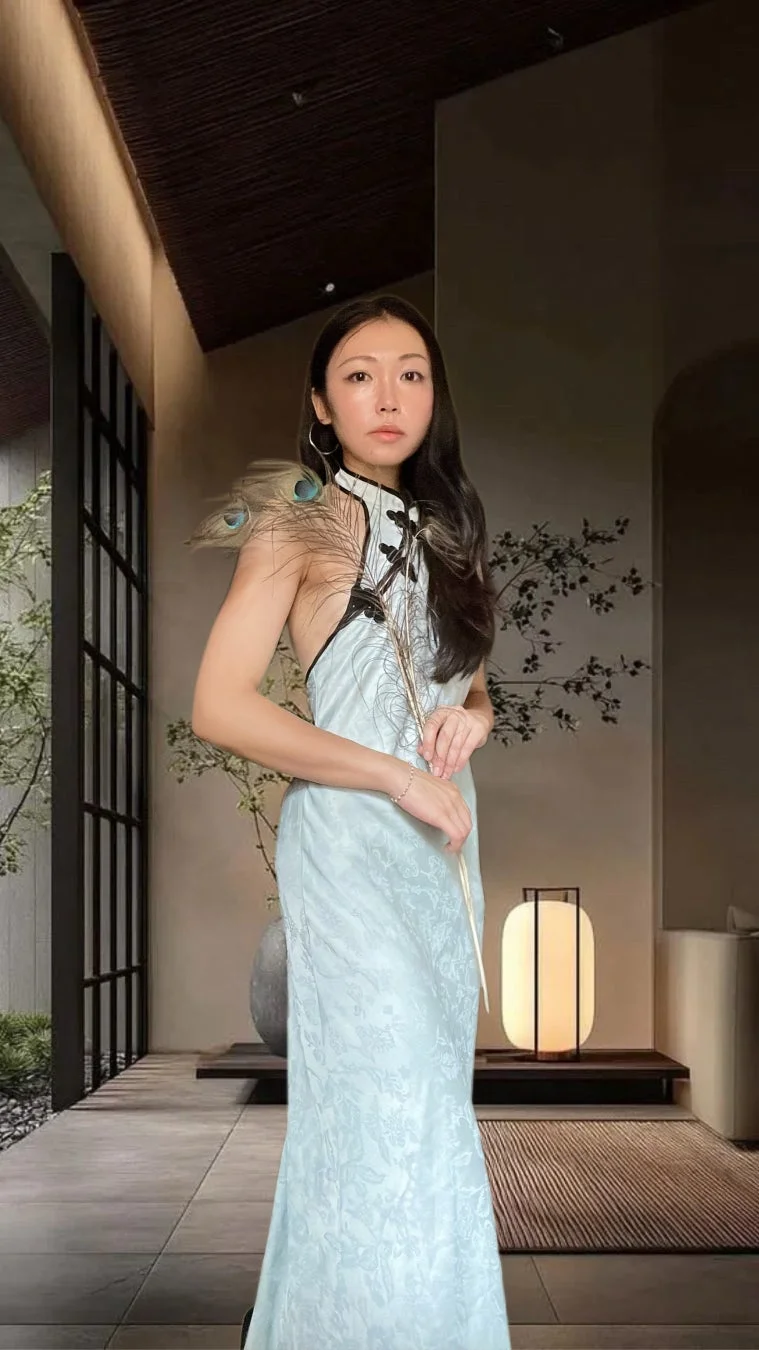 チャイナドレスを身につけた早坂理恵さんのポートレート